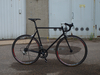 Stealth black road bike photo