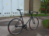 Stealth black road bike photo